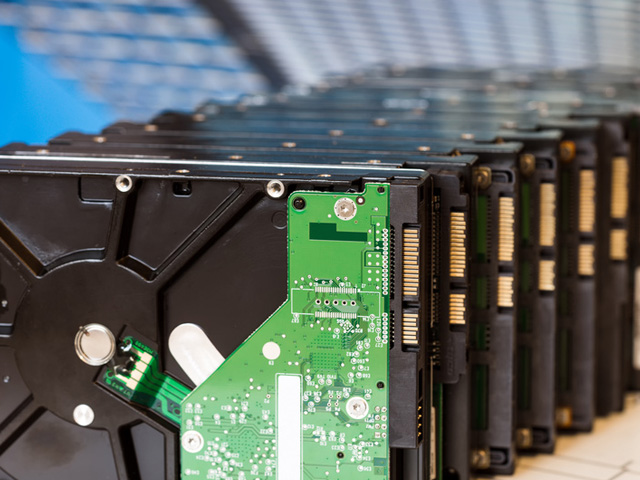 Hardrives representing the IT Lifecycle from purchase to data destruction
