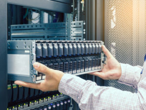 jbod rack of servers being removed by network engineer